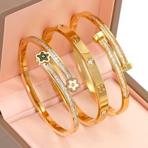 NEW❤️3 Elegant Gold Stainless Steel Bangle Set with Floral Accents